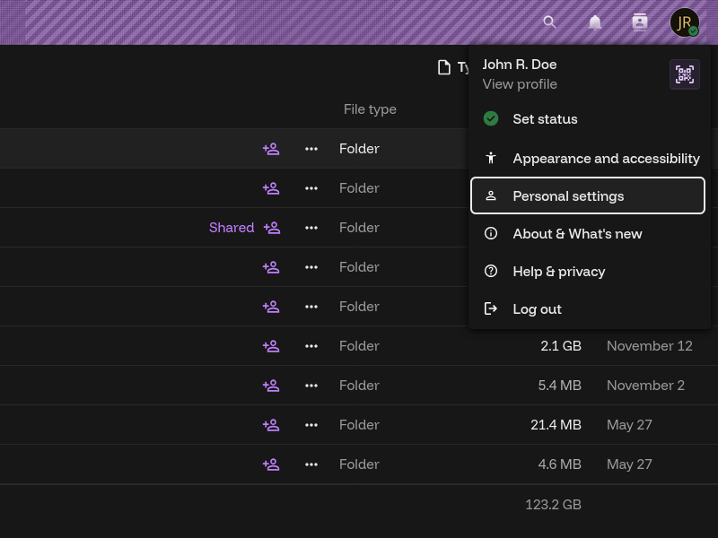 The header menu of Nextcloud, displayed atop the initial Files app. The user's name is "John R. Doe". Below the name are a list of links: "Appearance and accessibility", "Personal settings (highlighted)", "About & What's new", "Help & privacy", and "Log out".